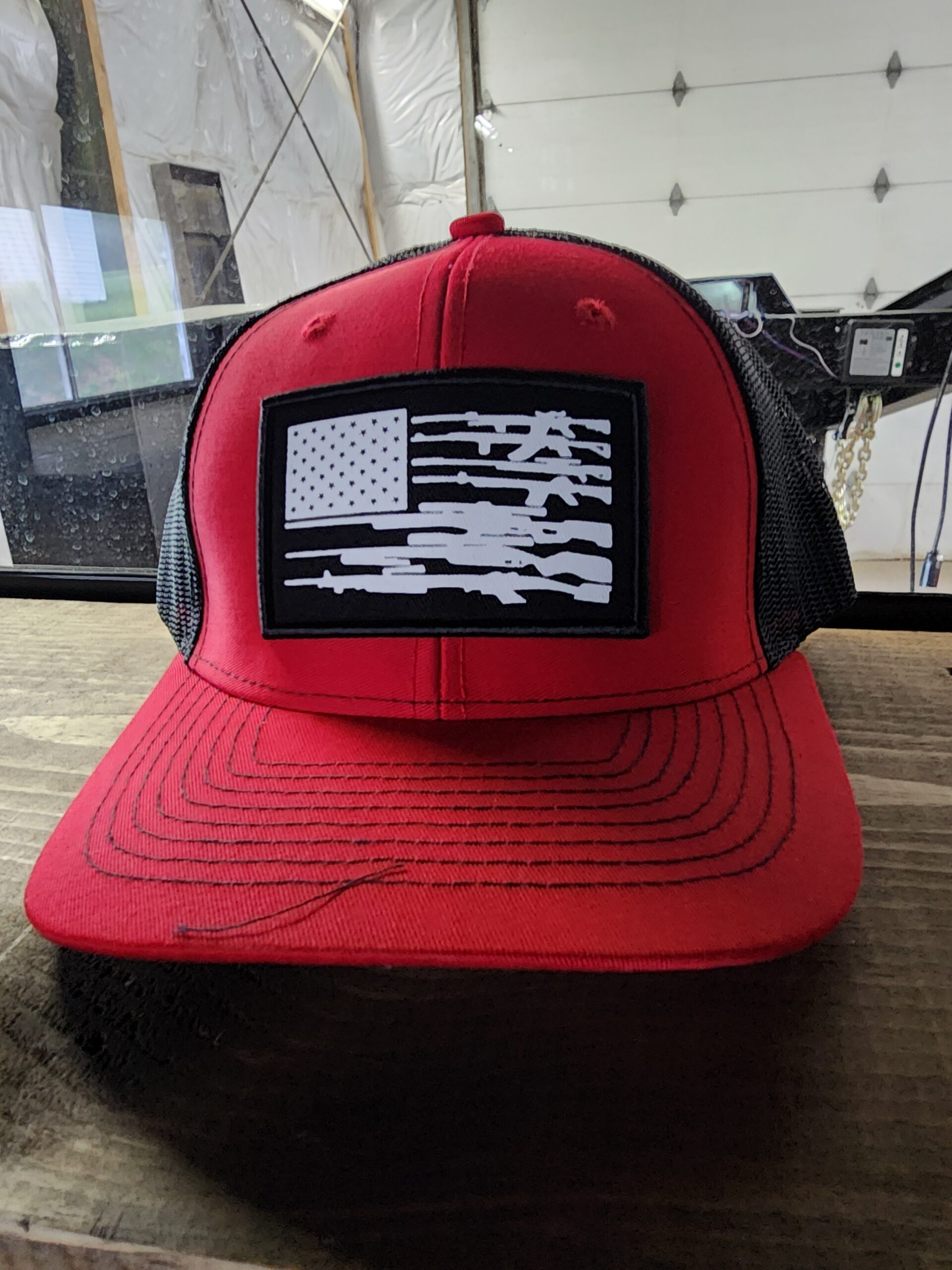 red and black american flag cap